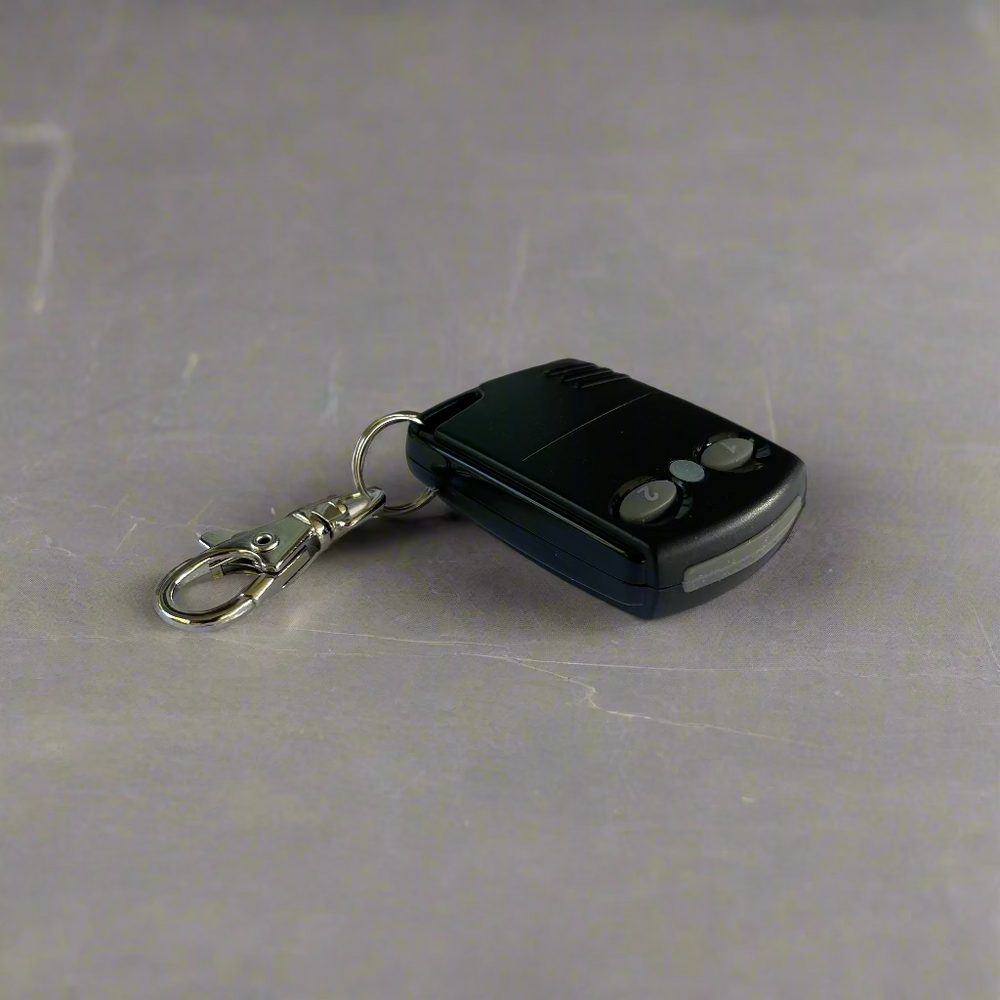 Close-up of the iKey Transmitter wireless access control device with one-touch functionality.