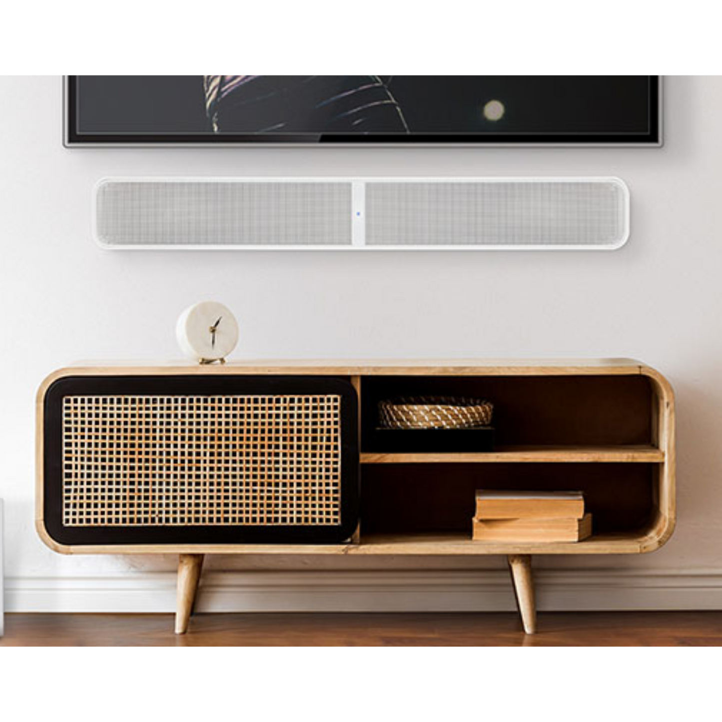 White Bluesound Pulse Soundbar + installed in living room